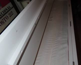 Murphy bed in cabinet.