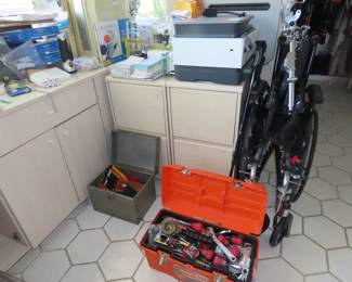 Filing cabinets, wheelchair, toolbox, printer, office supplies.