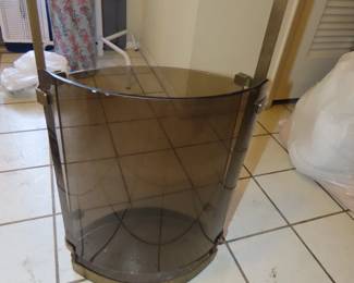Glass and brass umbrella stand.