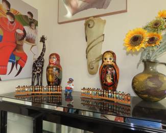 Two large Russian doll wine holders.