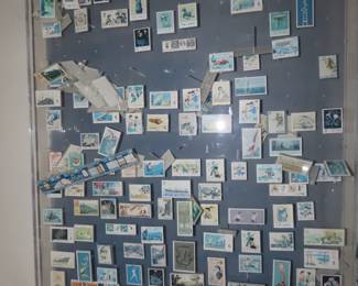 Lucite framed stamp collection.