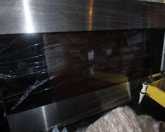 Brand new in wall mount fireplace.