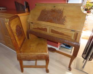 Asian themed hand carved drop down writing desk and chair.