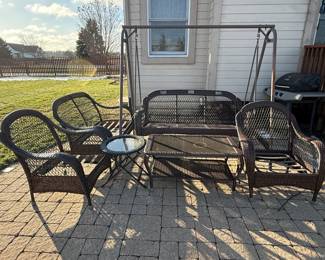 Outdoor Wicker Furniture. 1 Love Seat, 2 Arm Chairs, A Swing Couch, Coffee Table and Side Table. (Requires New Seat Cushions)