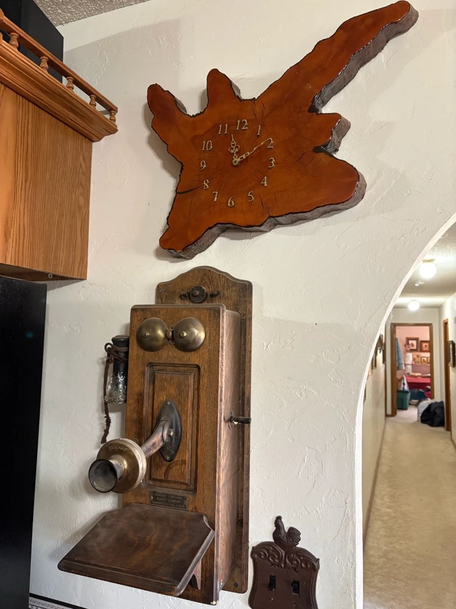 Antique crank phone, clock