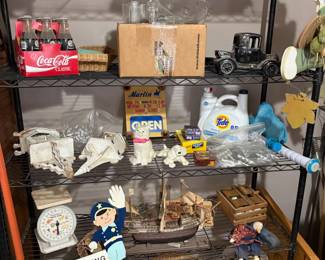 shelving NOT FOR SALE  baskets, scales, Coke bottles, 