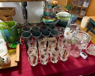 gold rim glasses in carrier