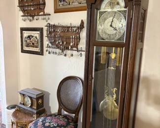 Grandfather clock, chair, spoons