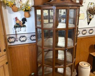 Curio cabinet, butter crock, clock