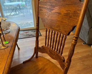 Solid oak press backed chairs