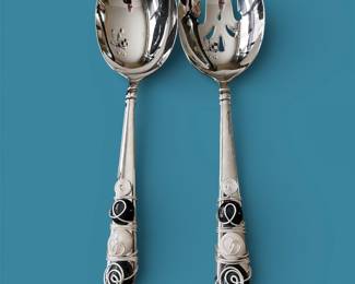 We’re diligently working on preparing this sale for you.  All pics to be loaded by Jan 4, 2026.   The item in this pic is a set of Lenox serving spoons that have been embellished by an artisan in the Florida panhandle. 