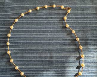 14 karat and pearl necklace