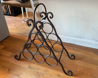 Vintage wrought iron 6-bottle triangular wine rack with scrollwork design $20 + tax