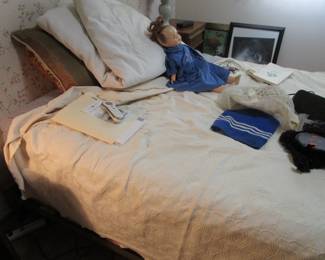 Sleep number bed with paperwork and remote