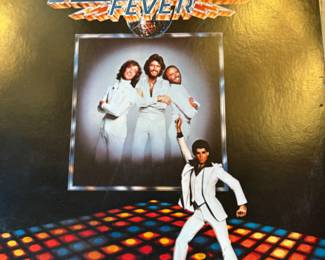 Lots of vinyl LPs, mostly rock and pop, including Beatles, Bette Midler, Stevie Wonder, Michael Jackson, Barry White, The Who, Bob Marley, Jimmy Buffet, Barbra Streisand, Wings, and more