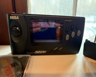 vintage Sega Nomad with battery pack
