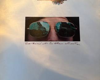 Lots of vinyl LPs, mostly rock and pop, including Beatles, Bette Midler, Stevie Wonder, Michael Jackson, Barry White, The Who, Bob Marley, Jimmy Buffet, Barbra Streisand, Wings, and more