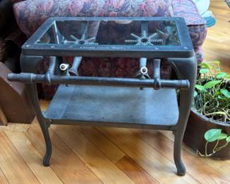 end table made from an antique cast iron stove