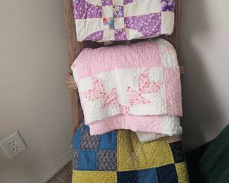 lots of vintage quilts