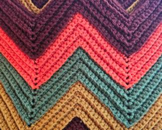 several colorful Afghans 