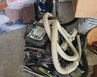 vintage vacuum with parts