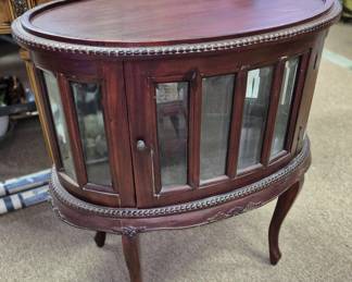 Queen Anne style curio cabinet