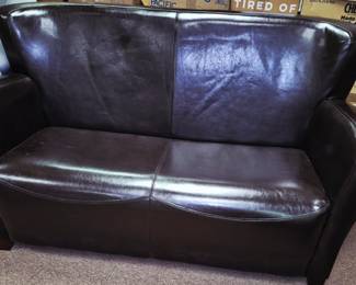 Much modern and antique furniture. Brown faux leather loveseat