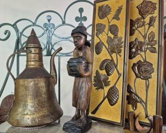Much modern and vintage home decor. Hammered copper pitcher. Vintage handcarved folk art statue and wall art