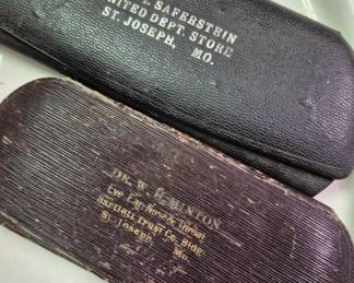 Dr. Saferstein" and "Dr. W. H. Minton" St. Joseph Mo eyeglass cases