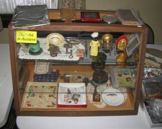 Display case with smalls