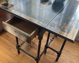 Drop-leaf table by Drexel.
