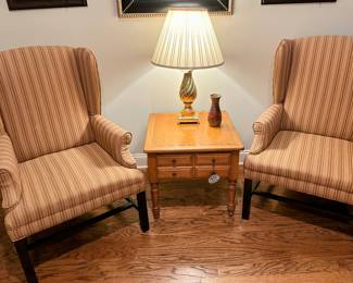 Classic wing-backed chairs and end table