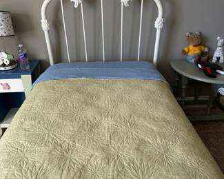 Ornate White Metal Twin Headboard and bedding
