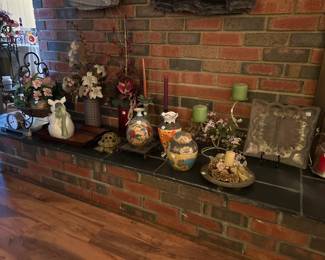 Vases, faux floral arrangements, candle risers