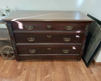 Dark Wooden Chest Of Drawers
