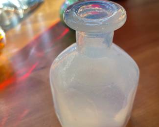 Milky white blown glass bottle $40