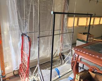 Brand new clothing racks with covers