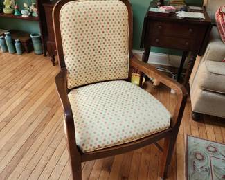 Upholstered wood armchair