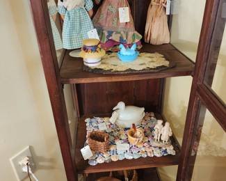 Native American dolls, glass birds on nests, baskets