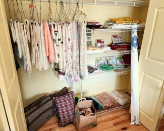 Linens including Lenox tablecloths, fabrics, luggage