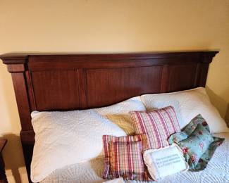 Queen bed with Serta Perfect Sleeper mattress and wood headboard