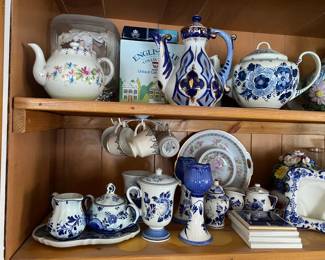 Russian Fenix Teapot ( top center ) and others Delft & other china on bottom shelf