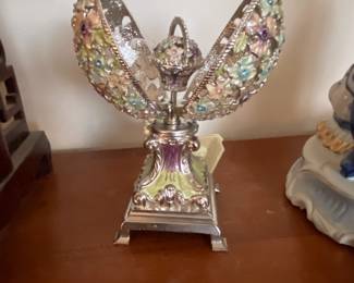 Collette Et Cie Jeweled gem open to show rotating flowers