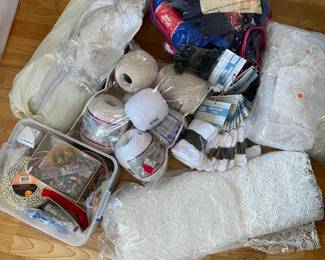 Fine quality sewing supplies , some were used to make the beautiful doll clothes and lamp shades in this home