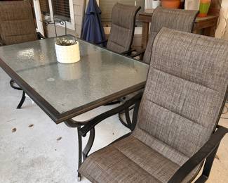 Patio Glass top Table and 4 swivel chairs