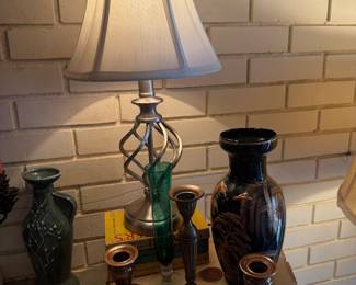 Vases and brass candle holders. 