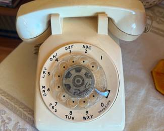 It’s not Red and it’s not the Bat-Phone but it’s a nice vintage rotary phone. Get and set it somewhere in your house. Then when some young kids come around baffled about what it is you can tell them about the good old days and explain what it is and how it works. 