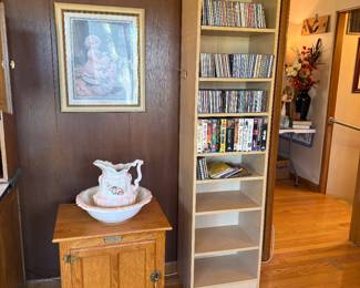 We believe this to be an old icebox. It appears to have been altered on the inside some. Still a really cool and unique piece.