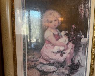 We call this picture “Sitting girl holding a duck.” 🤷‍♂️  All kidding aside, it’s a pretty print. 