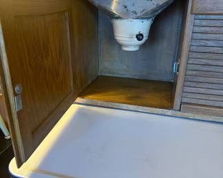Sifting flour in your kitchen command center. The Hoosier Cabinet made life so easy for the women in the kitchen back in the day. 😂😂😂 